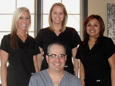 Dr Hayes and his dental staff